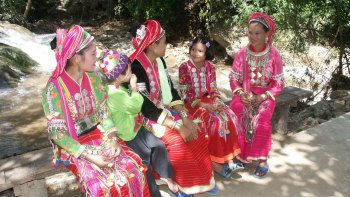 Elephant Trek, River Rafting & Hill-Tribe Villages Full-Day Tour
