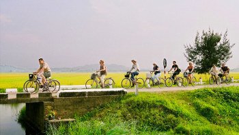 Private Full-Day Hue Bike Tour with Perfume River Boat Ride