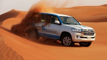 Dubai Morning Safari: Red Dunes, Sandsurf, Camels & Brunch