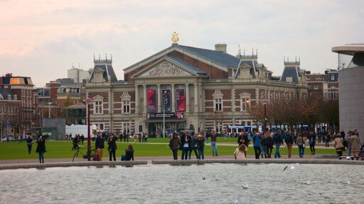 Museum Quarter featuring a pond, heritage architecture and street scenes