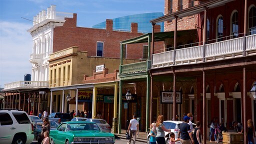 Old Sacramento which includes street scenes and heritage architecture as well as a small group of people