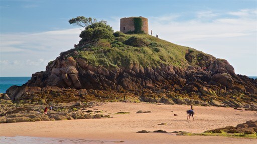 Jersey which includes a beach, rocky coastline and general coastal views