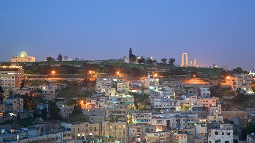 Amman showing landscape views, night scenes and a city