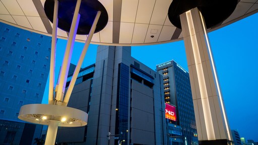 Asahikawa que inclui uma cidade e cenas noturnas