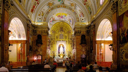 Basílica de la Macarena ofreciendo arte, elementos religiosos y vistas de interior