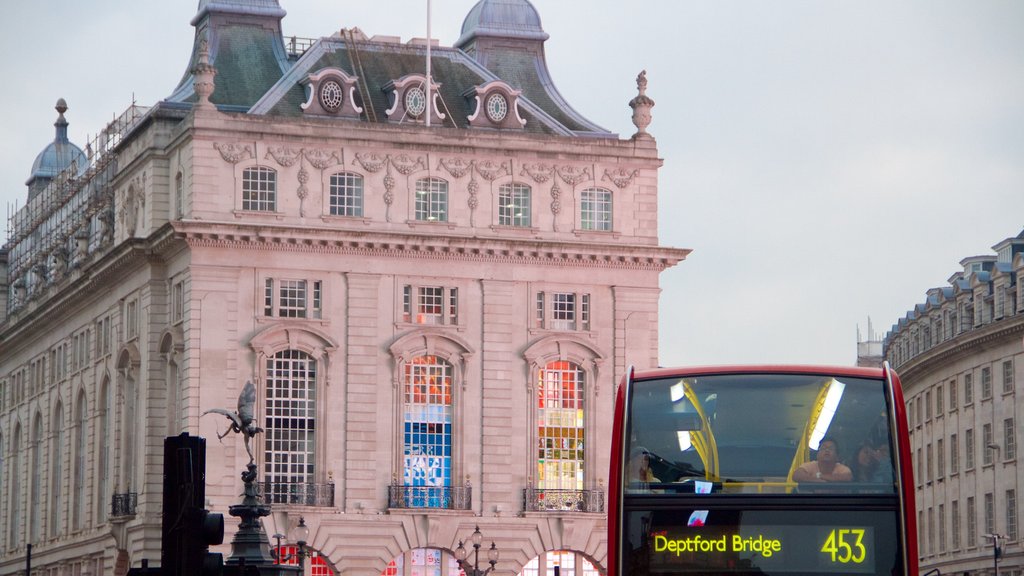 Piccadilly Circus featuring heritage architecture and a city