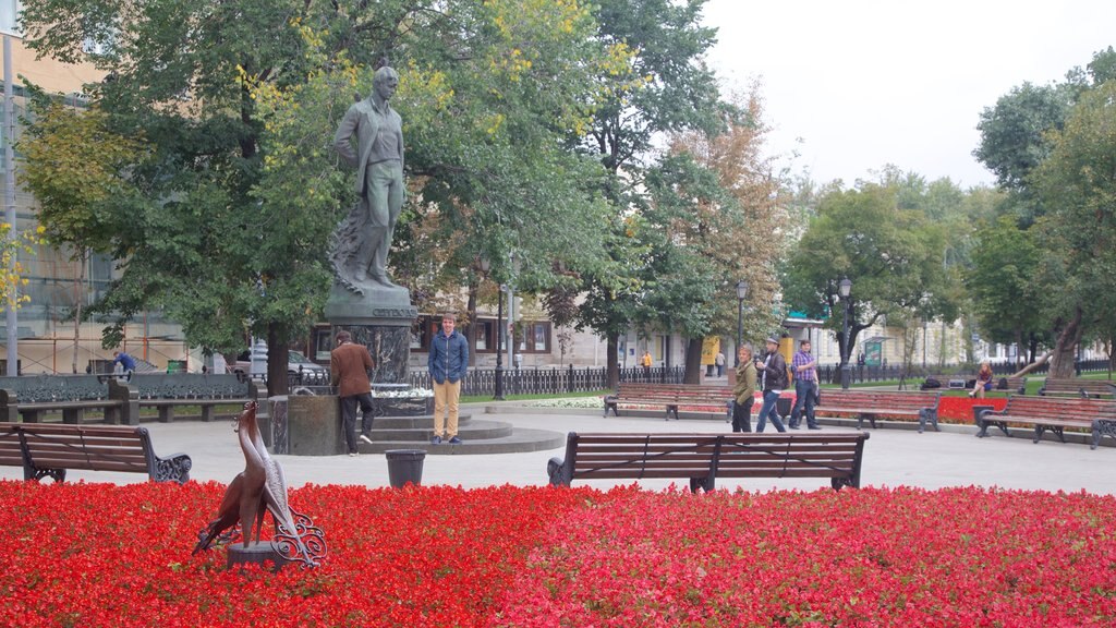 Moscow which includes a park and a statue or sculpture