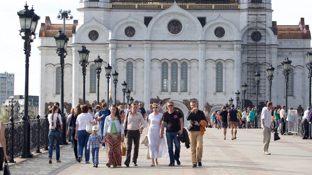 Cathedral of Christ the Savior featuring heritage architecture as well as a small group of people