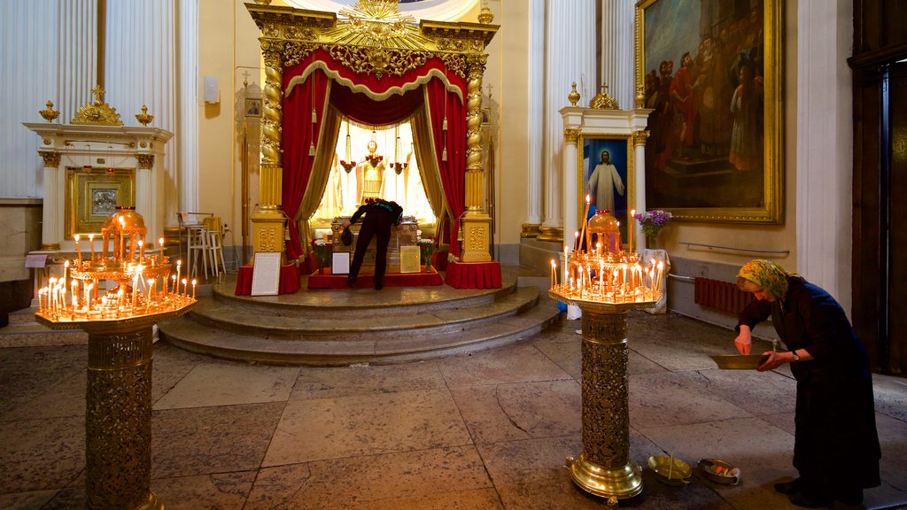 Alexander Nevsky Lavra which includes a church or cathedral and interior views