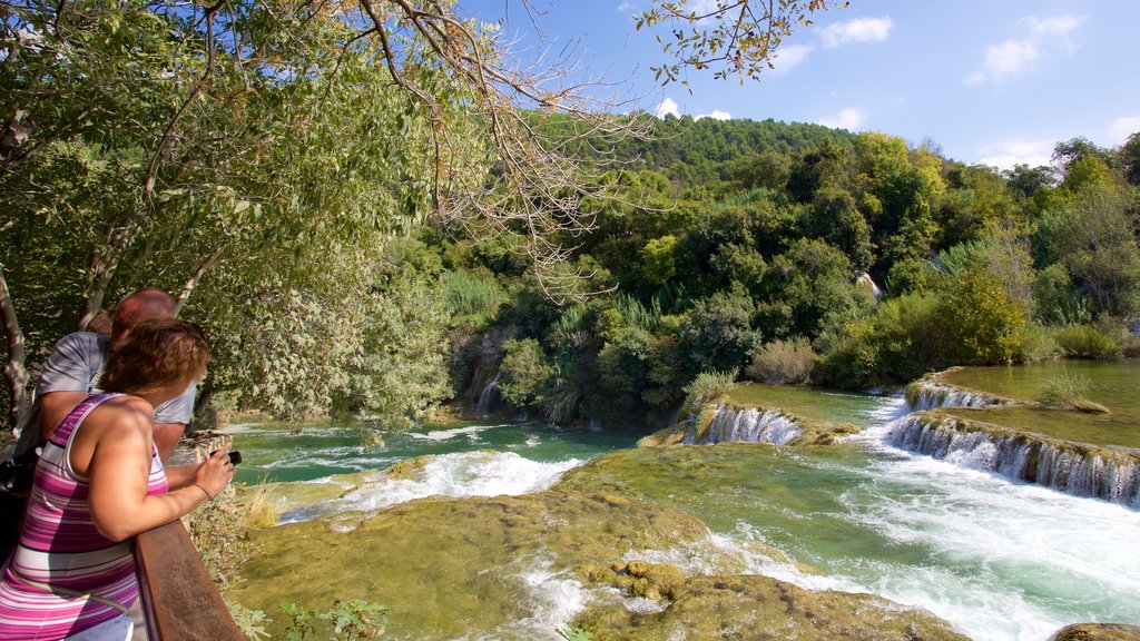 Krka National Park featuring a river or creek as well as a couple