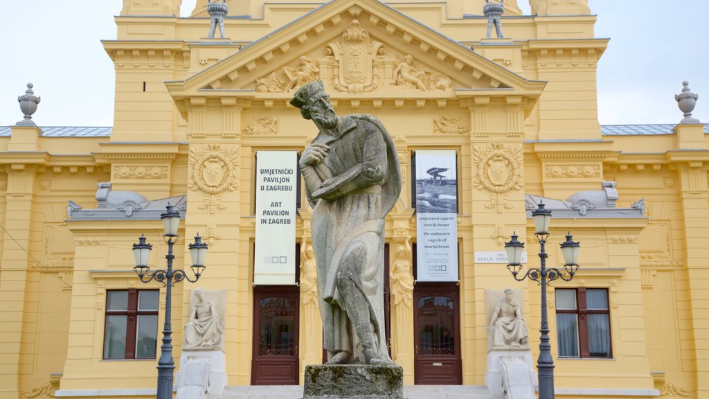 Pabellón de Arte ofreciendo arte, una estatua o escultura y arquitectura patrimonial