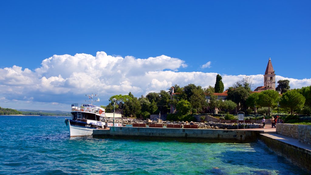 Red Island showing a bay or harbour and boating