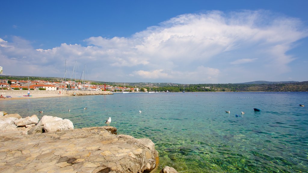 Primosten Beach featuring rocky coastline and a coastal town