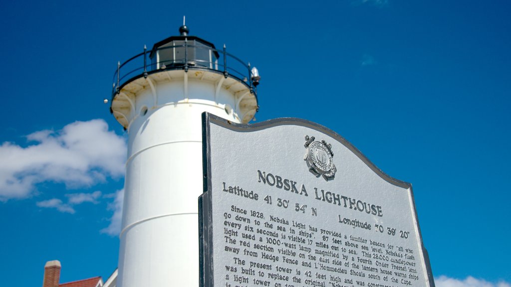 Nobska Lighthouse showing signage and a lighthouse