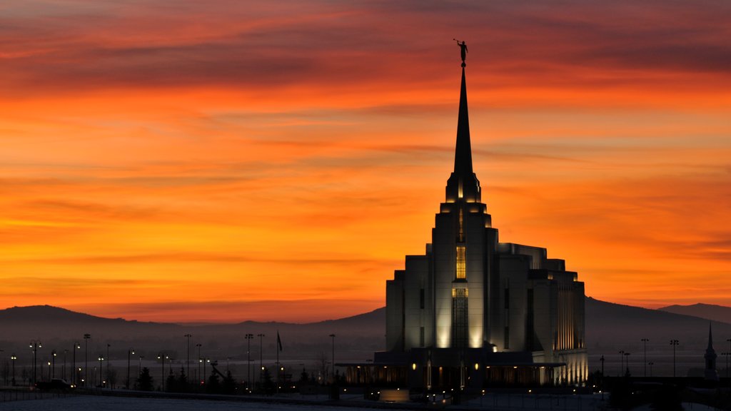 Rexburg featuring a sunset and a church or cathedral