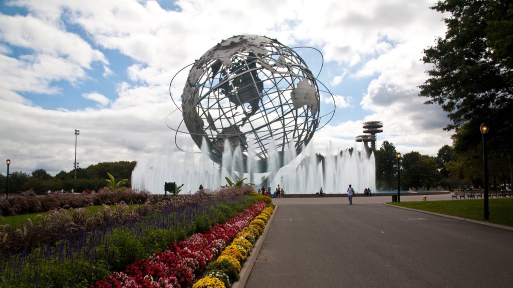 Corona que incluye una estatua o escultura, flores y una fuente