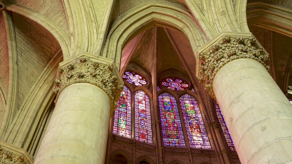 Reims Cathedral showing interior views, a church or cathedral and heritage architecture