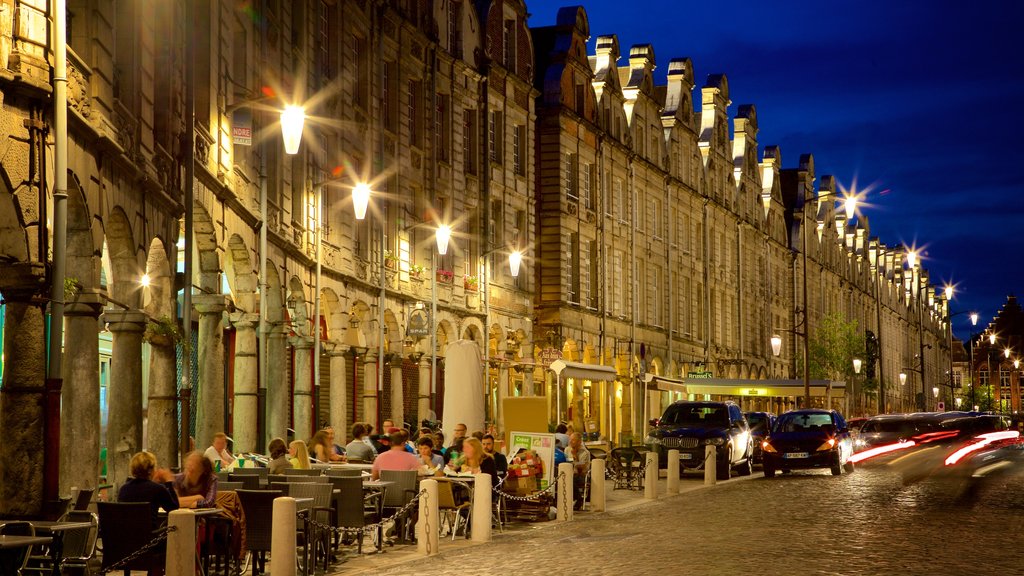 Grand Place showing night scenes and dining out