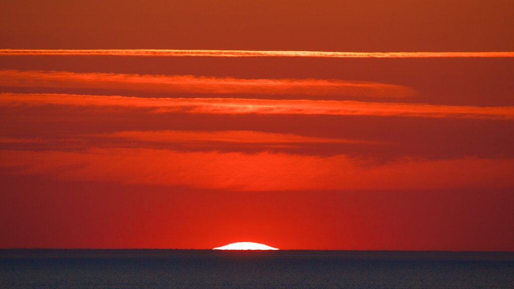 Ile de Re Bridge which includes a sunset