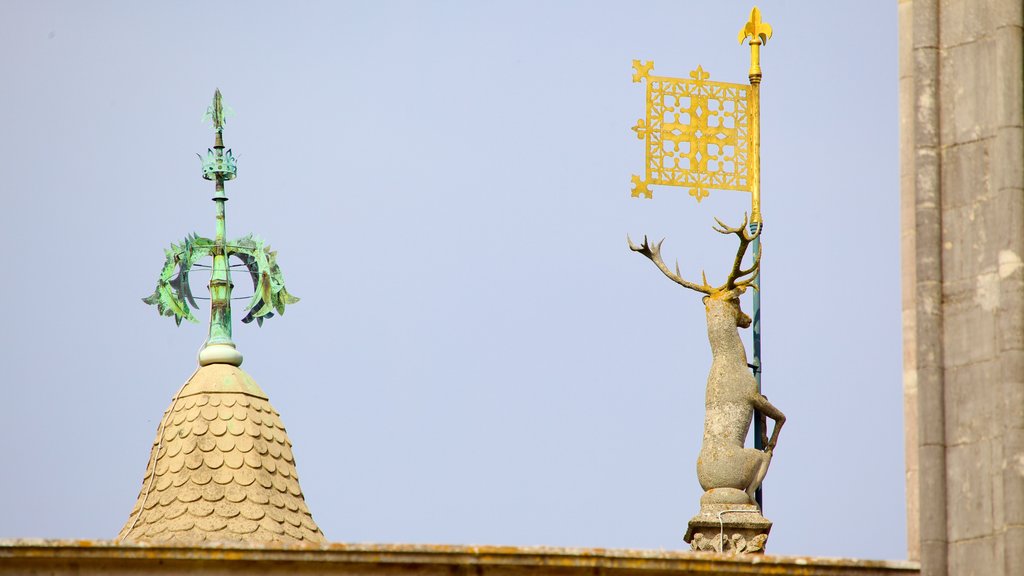 Highcliffe Castle featuring heritage elements and a statue or sculpture