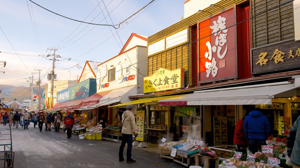 Hakodate showing street scenes as well as a large group of people