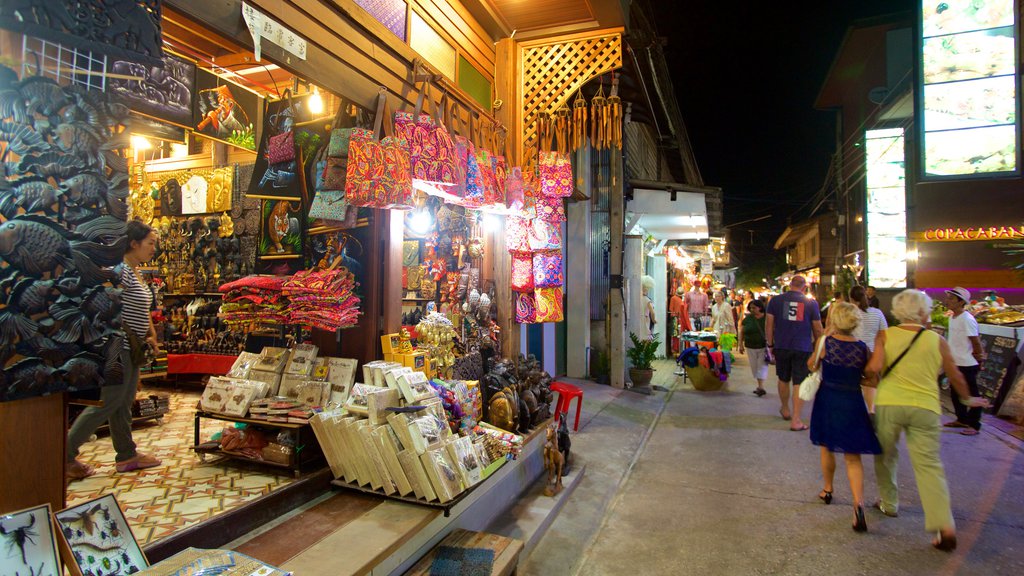 Fisherman\'s Village showing shopping and night scenes as well as a large group of people