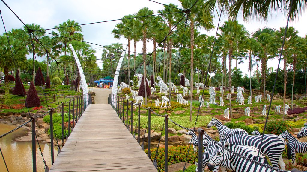 Nong Nooch Tropical Botanical Garden showing a bridge and outdoor art