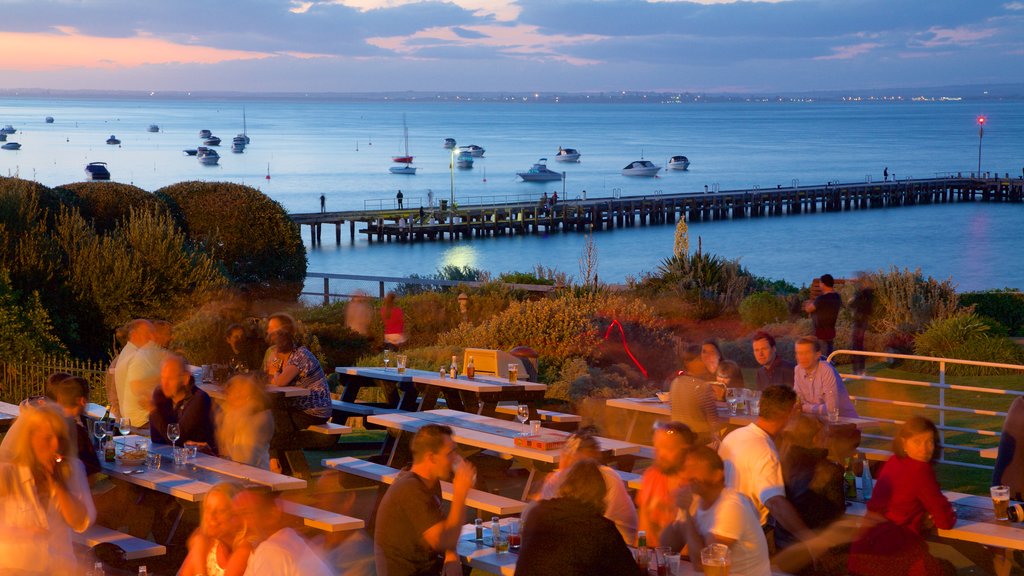 Portsea which includes general coastal views, outdoor eating and a sunset