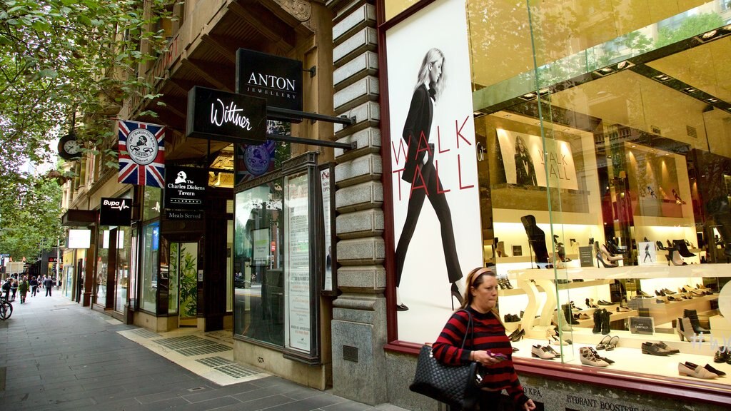 Collins Street which includes shopping as well as an individual female