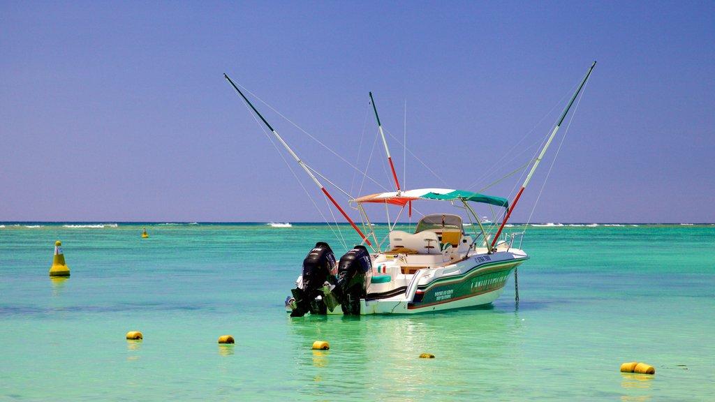 Trou aux Biches which includes boating and general coastal views