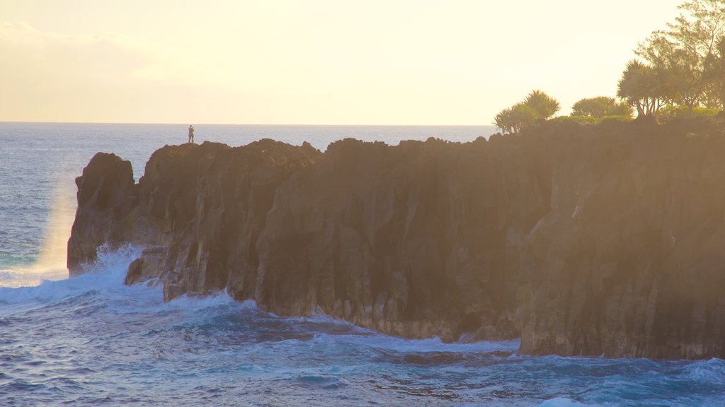 Cape Mechant featuring rocky coastline