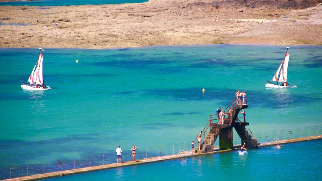 St. Malo Beach which includes general coastal views, sailing and a bay or harbor