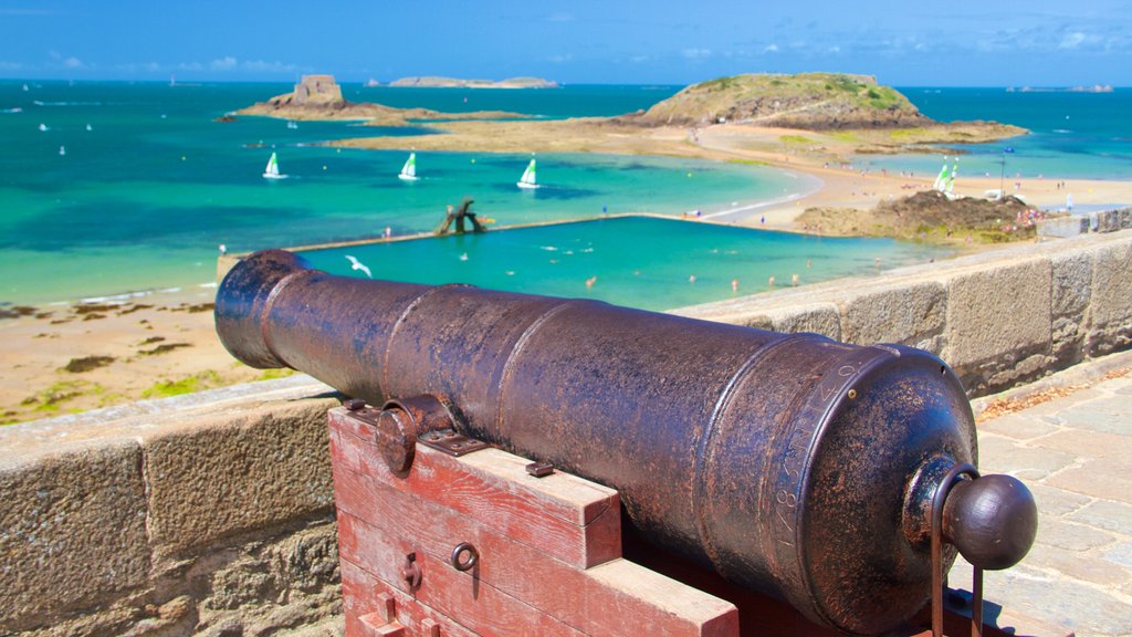 St. Malo Beach showing a bay or harbour, general coastal views and heritage elements