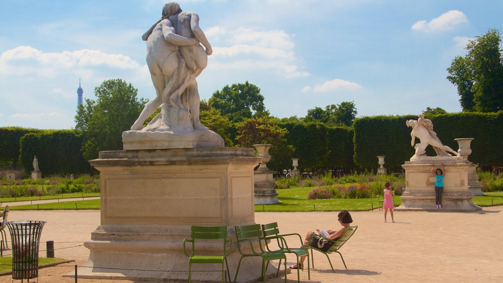 Tuileries Garden which includes a statue or sculpture and a park