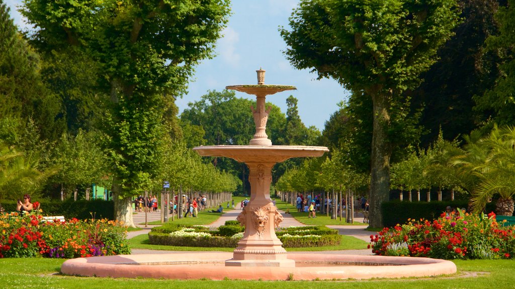 L\'Orangerie Garden featuring a fountain and a garden