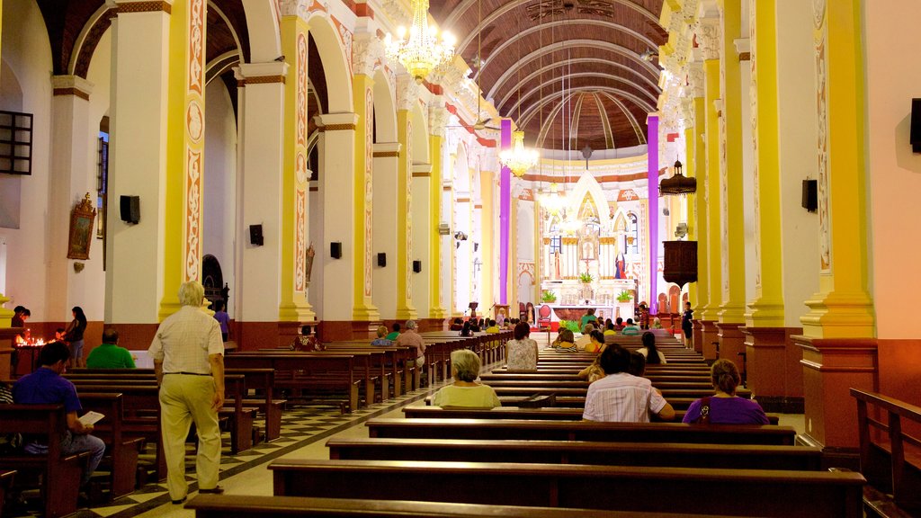 San Lorenzo Cathedral showing a church or cathedral and interior views