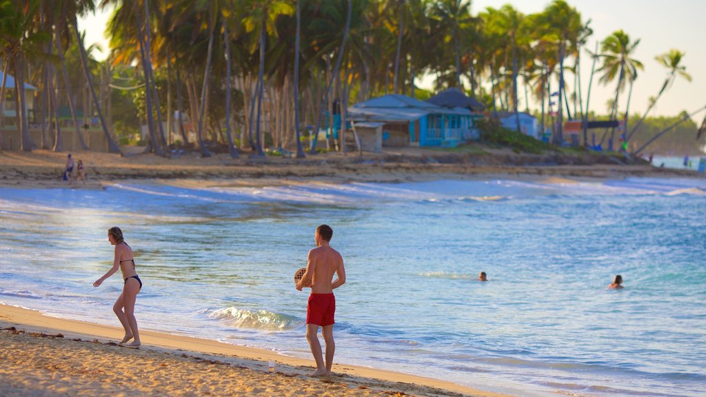 Uvero Alto which includes a sandy beach as well as a small group of people