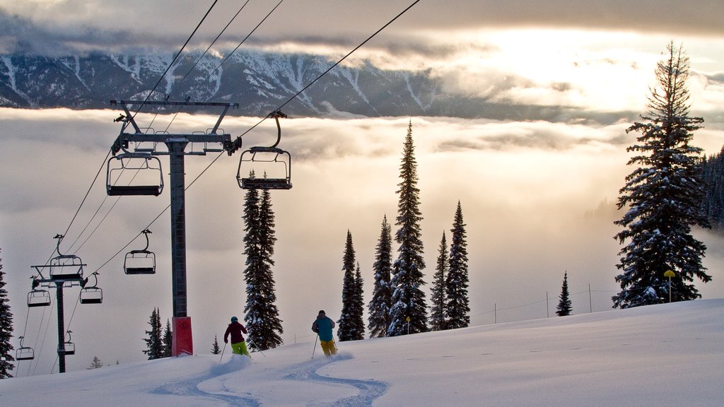 Fernie Alpine Resort which includes landscape views, a gondola and a sunset