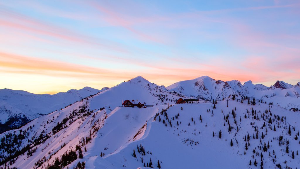 Kicking Horse Mountain Resort showing a sunset, snow and landscape views