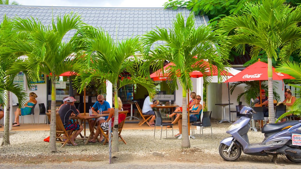 Muri Beach which includes outdoor eating as well as a small group of people