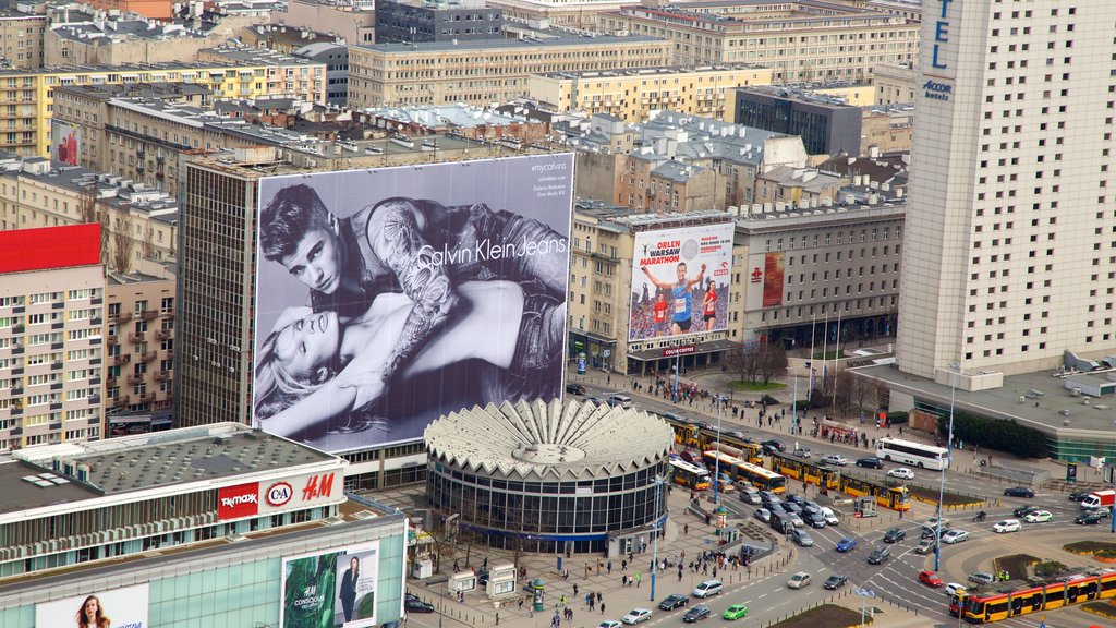 Palace of Culture and Science which includes a city, signage and central business district