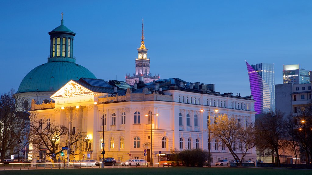 Pilsudski Square which includes night scenes and a city