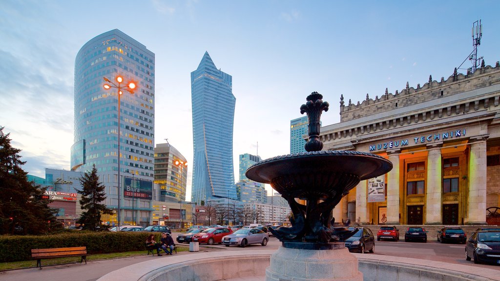 Palace of Culture and Science showing a fountain and a city