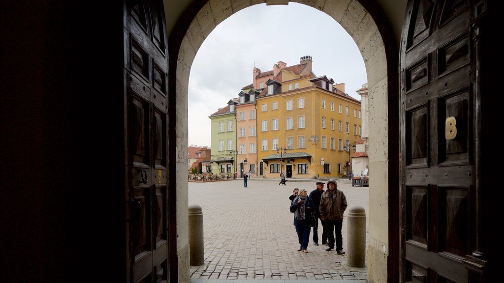 Castle Square featuring heritage elements as well as a small group of people