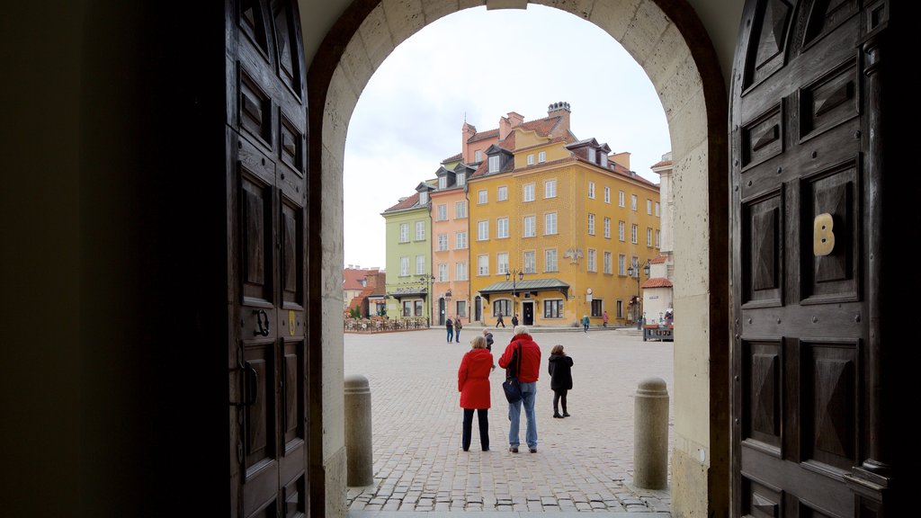 Castle Square featuring heritage elements as well as a small group of people