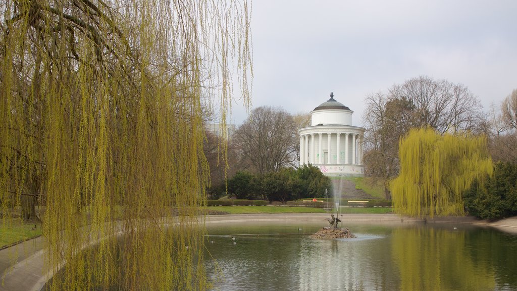 Saxon Gardens featuring a pond and a fountain