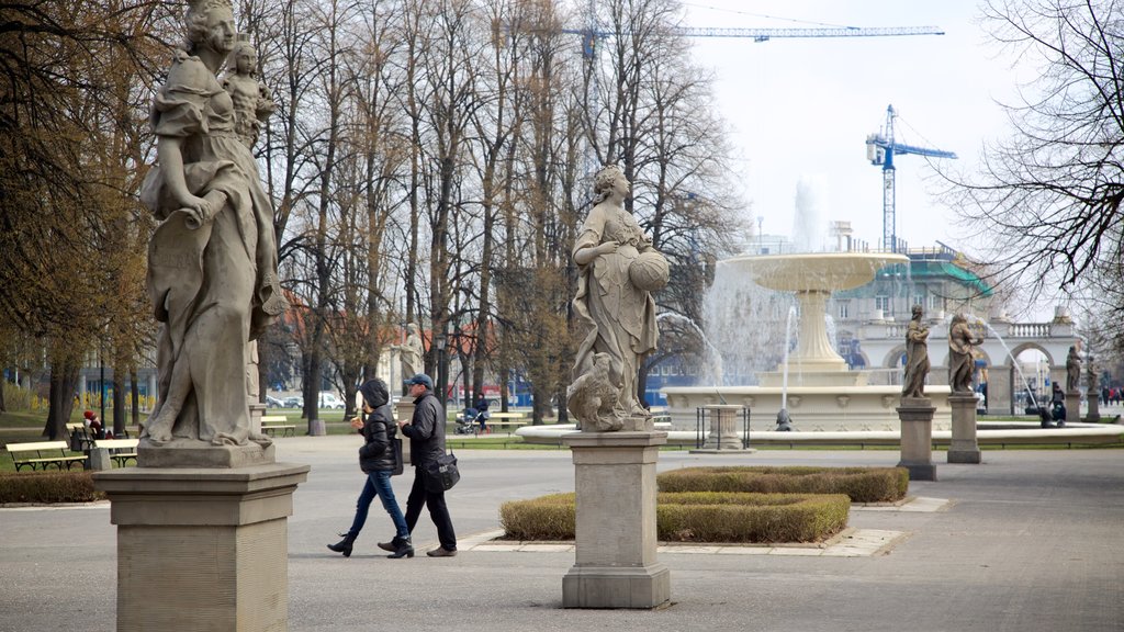 Saxon Gardens showing a fountain and a statue or sculpture