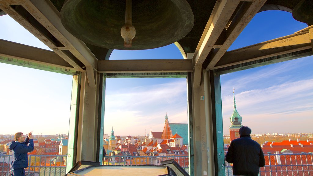 St. Anne\'s Church showing a city as well as a small group of people