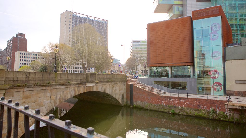 People\'s History Museum showing a bridge, a city and a river or creek