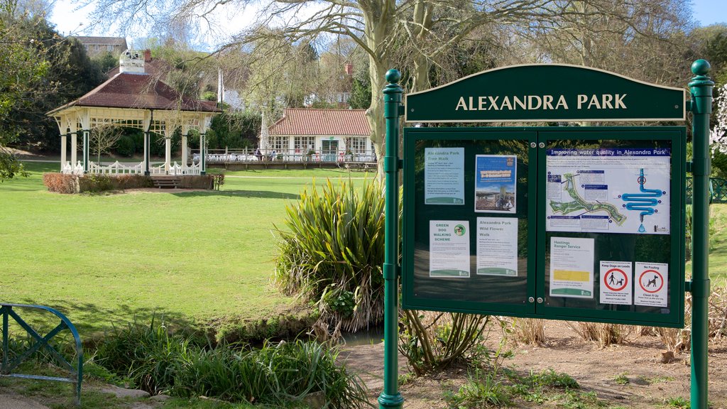 Alexandra Park showing signage and a garden